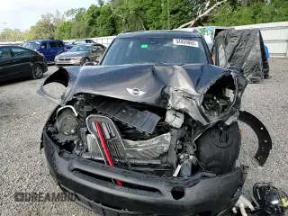 2015 MINI Countryman S with VIN WMWZC3C57FWP52868, listed as a Copart auction lot 54909085 with 68,003 mi miles and Salvage title. Bid and sale history available at DreamBid. Image 14.