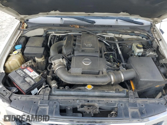 2009 Nissan Frontier SE with VIN 1N6AD07U19C411546, listed as a Copart auction lot 57683625 with 216,492 mi miles and Salvage title. Bid and sale history available at DreamBid. Image 11.