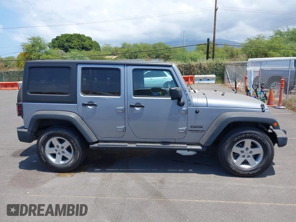 2016 Jeep Wrangler Unlimited Freedom with VIN 1C4BJWDG7GL109953, listed as a IAAI auction lot 42140111 with 24,570 mi miles and . Bid and sale history available at DreamBid. Image 13.