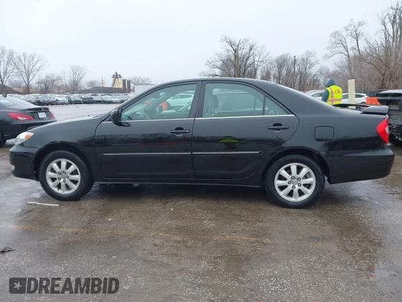 2004 Toyota Camry LE with VIN 4T1BF32K84U074364, listed as a IAAI auction lot 41479264 with 265,865 mi miles. Bid and sale history available at carsss.com. Image 14.