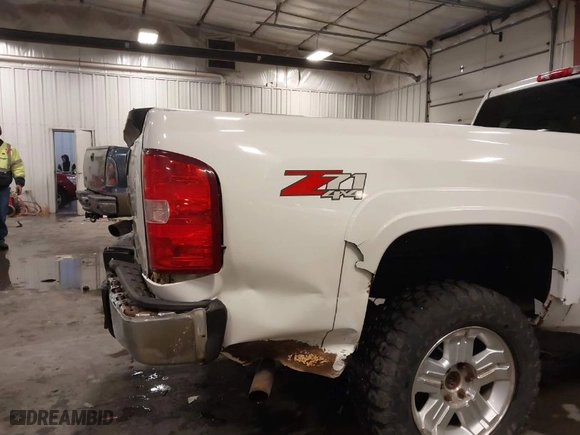 2013 Chevrolet Silverado 1500 LT with VIN 1GCNKSE02DZ169359, listed as a IAAI auction lot 41607634 with 215,431 mi miles. Bid and sale history available at carsss.com. Image 21.