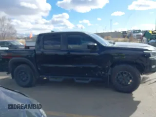 2023 Nissan Frontier SV with VIN 1N6ED1EK0PN658048, listed as a IAAI auction lot 41383407 with 13,744 mi miles and . Bid and sale history available at DreamBid. Image 14.