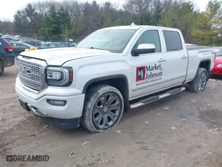 2018 GMC Sierra 1500 Denali with VIN 3GTU2PEJ6JG520383, listed as a IAAI auction lot 41849192 with 152,970 mi miles. Bid and sale history available at carsss.com. Image 17.