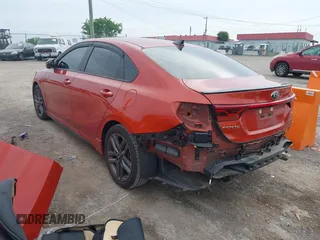 2021 Kia Forte GT-Line z VIN 3KPF34AD7ME410270, wystawiony jako IAAI lot #42259704 z przebiegiem 65 310 mil mil oraz . Historia ofert i sprzedaży dostępna na DreamBid. Obrazek 3.