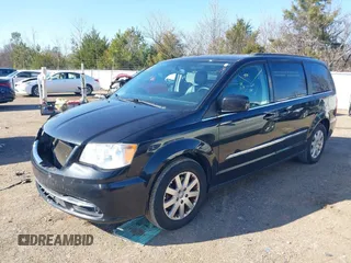 2015 Chrysler Town & Country Touring with VIN 2C4RC1BG9FR626501, listed as a IAAI auction lot 41279210 with 211,206 mi miles and . Bid and sale history available at DreamBid. Image 2.