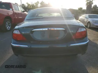 2003 Jaguar S-Type z VIN SAJEA01U73HM48330, wystawiony jako Copart lot #80128574 z przebiegiem Nie podano mil oraz Szkody całkowita. Historia ofert i sprzedaży dostępna na DreamBid. Obrazek 6.