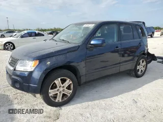 2012 Suzuki Grand Vitara Premium z VIN JS3TD0D29C4100139, wystawiony jako Copart lot #49163115 z przebiegiem 271 080 mil mil oraz Nie do naprawy. Historia ofert i sprzedaży dostępna na DreamBid. Obrazek 1.