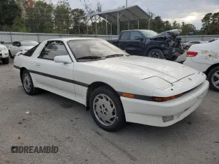 1988 Toyota Supra z VIN JT2MA71J0J0088041, wystawiony jako Copart lot #84402804 z przebiegiem 195 921 mil mil oraz Czysty tytuł • Clean title. Historia ofert i sprzedaży dostępna na DreamBid. Obrazek 4.