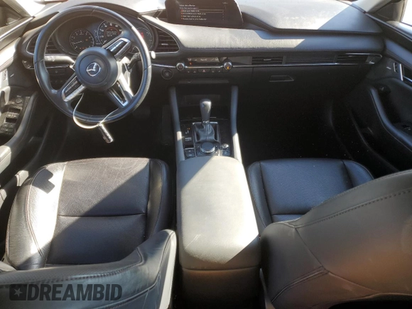 2019 Mazda 3 Premium with VIN 3MZBPAEM2KM104699, listed as a Copart auction lot 86170374 with 59,618 mi miles and Salvage Title. Bid and sale history available at DreamBid. Image 8.