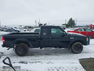 2011 Ford Ranger XLT with VIN 1FTLR4FE5BPA15181, listed as a IAAI auction lot 41487647 with 171,894 mi miles. Bid and sale history available at carsss.com. Image 13.