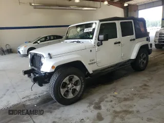 2016 Jeep Wrangler Unlimited Sahara with VIN 1C4BJWEGXGL310499, listed as a Copart auction lot 59756015 with 128,498 mi miles and Salvage title. Bid and sale history available at DreamBid. Image 1.