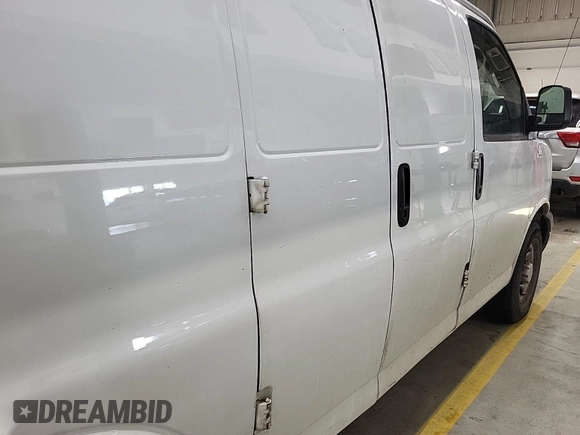 2020 Chevrolet Express Cargo Van with VIN 1GCWGAFG0L1157588, listed as a IAAI auction lot 42122898 with 156,235 mi miles. Bid and sale history available at carsss.com. Image 1.