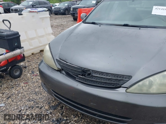 2004 Toyota Camry LE with VIN 4T1BE32K64U868802, listed as a IAAI auction lot 42141061 with 254,215 mi miles. Bid and sale history available at carsss.com. Image 6.