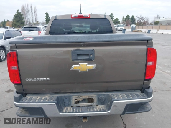 2015 Chevrolet Colorado 4WD WT with VIN 1GCGTAE38F1197422, listed as a IAAI auction lot 41439049 with 138,648 mi miles and . Bid and sale history available at DreamBid. Image 16.