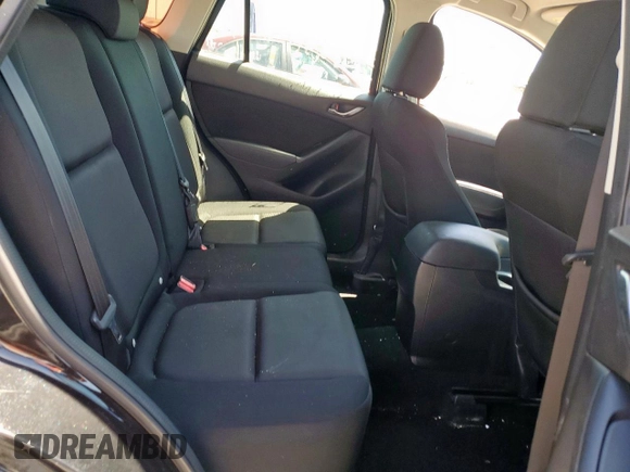 2016 Mazda CX-5 Sport z VIN JM3KE2BY3G0886115, wystawiony jako Copart lot #53803325 z przebiegiem Nie podano mil oraz Szkoda całkowita • Salvage title. Historia ofert i sprzedaży dostępna na DreamBid. Obrazek 11.