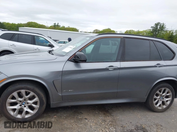 2014 BMW X5 xDrive50i with VIN 5UXKR6C54E0C02423, listed as a IAAI auction lot 42278044 with 122,370 mi miles and . Bid and sale history available at DreamBid. Image 14.