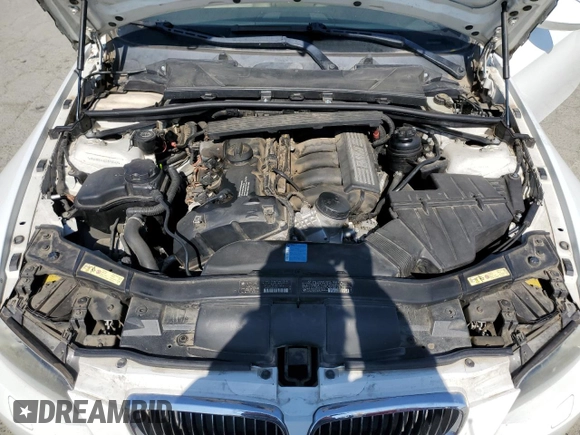 2007 BMW 3 Series 328i z VIN WBAWV13587PK49878, wystawiony jako Copart lot #60244745 z przebiegiem 174 263 mil mil oraz Szkoda całkowita • Salvage title. Historia ofert i sprzedaży dostępna na DreamBid. Obrazek 11.