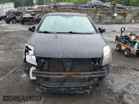 2012 Nissan Sentra SR z VIN 3N1AB6AP7CL637717, wystawiony jako Copart lot #58307055 z przebiegiem 159 833 mil mil oraz Nie do naprawy • Non repairable. Historia ofert i sprzedaży dostępna na DreamBid. Obrazek 5.