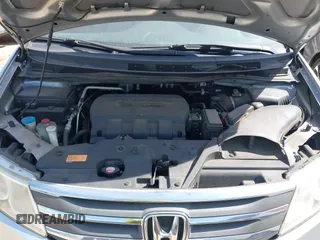 2012 Honda Odyssey Touring with VIN 5FNRL5H92CB108690, listed as a IAAI auction lot 41826580 with 150,327 mi miles and . Bid and sale history available at DreamBid. Image 10.