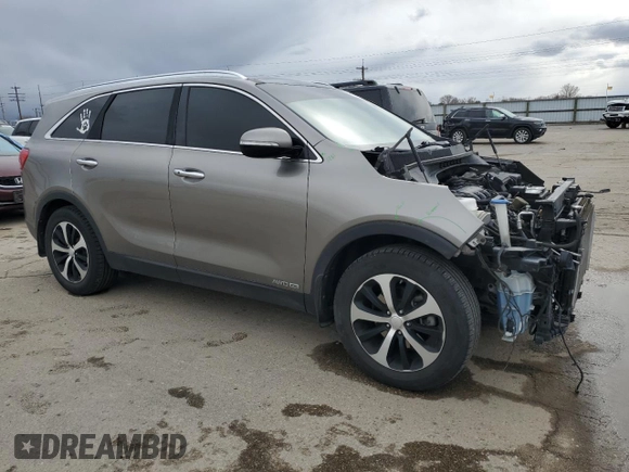 2016 Kia Sorento EX with VIN 5XYPHDA59GG129660, listed as a Copart auction lot 49499595 with 104,784 mi miles and Salvage Title. Bid and sale history available at carsss.com. Image 4.
