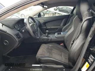 2015 Aston Martin Vantage z VIN SCFEBBAL2FGC18949, wystawiony jako Copart lot #54389965 z przebiegiem Nie podano mil oraz Szkody całkowita. Historia ofert i sprzedaży dostępna na DreamBid. Obrazek 7.
