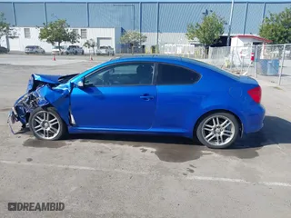 2006 Scion tC with VIN JTKDE167560136252, listed as a IAAI auction lot 42000724 with 168,727 mi miles. Bid and sale history available at carsss.com. Image 14.
