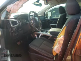 2017 Nissan Titan XD SV with VIN 1N6AA1F28HN551630, listed as a Copart auction lot 87104504 with 136,518 mi miles and Salvage Title. Bid and sale history available at carsss.com. Image 7.