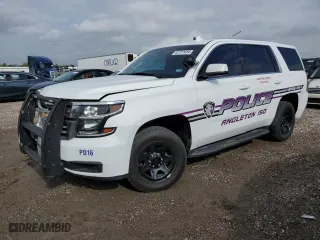 2020 Chevrolet Tahoe Commercial with VIN 1GNSKDEC5LR121594, listed as a Copart auction lot 82779484 with 32,019 mi miles and Salvage Title. Bid and sale history available at carsss.com. Image 1.