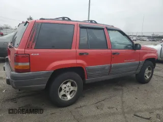 1996 Jeep Grand Cherokee Laredo with VIN 1J4GZ58S7TC292217, listed as a Copart auction lot 80757904 with 156,041 mi miles and Salvage Title. Bid and sale history available at carsss.com. Image 3.