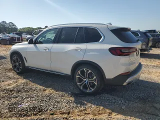 2021 BMW X5 sDrive40i with VIN 5UXCR4C05M9H39972, listed as a Copart auction lot 50839725 with 63,970 mi miles and Salvage Title. Bid and sale history available at carsss.com. Image 2.
