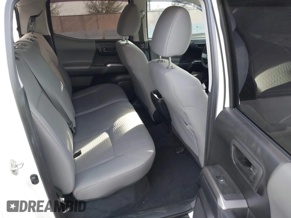 2019 Toyota Tacoma SR z VIN 3TMCZ5AN6KM284101, wystawiony jako IAAI lot #41099466 z przebiegiem 36 119 mil mil oraz . Historia ofert i sprzedaży dostępna na DreamBid. Obrazek 8.
