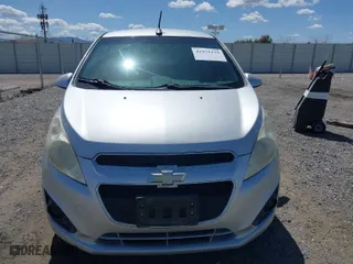 2014 Chevrolet Spark LT with VIN KL8CD6S91EC551097, listed as a IAAI auction lot 41975175 with 98,996 mi miles. Bid and sale history available at carsss.com. Image 6.