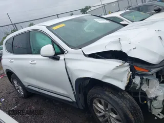 2019 Hyundai Santa Fe SE with VIN 5NMS2CAD1KH032805, listed as a IAAI auction lot 42385798 with Not provided miles and . Bid and sale history available at DreamBid. Image 12.