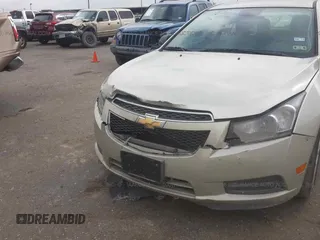 2014 Chevrolet Cruze LS with VIN 1G1PA5SH8E7230310, listed as a IAAI auction lot 16260693 with 36,756 mi miles and . Bid and sale history available at DreamBid. Image 6.