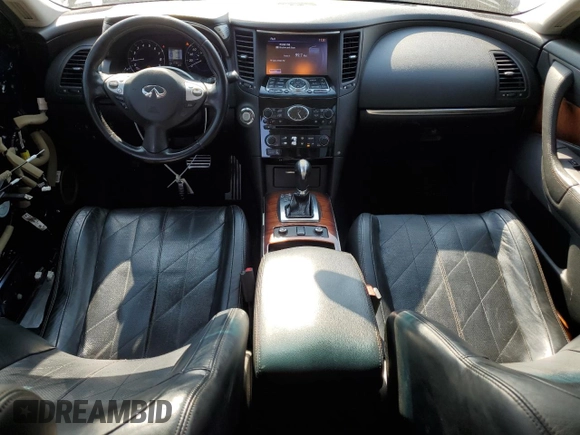 2015 Infiniti QX70 z VIN JN8CS1MU2FM380734, wystawiony jako Copart lot #76012944 z przebiegiem 173 813 mil mil oraz Szkoda całkowita • Salvage title. Historia ofert i sprzedaży dostępna na DreamBid. Obrazek 8.