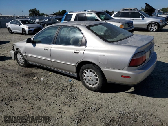 1997 Honda Accord EX with VIN 1HGCD5667VA025961, listed as a Copart auction lot 72125824 with 242,047 mi miles and Salvage Title. Bid and sale history available at carsss.com. Image 2.