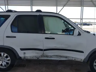 2005 Honda CR-V EX z VIN JHLRD78845C025264, wystawiony jako IAAI lot #41752341 z przebiegiem 196 753 mil mil oraz . Historia ofert i sprzedaży dostępna na DreamBid. Obrazek 14.