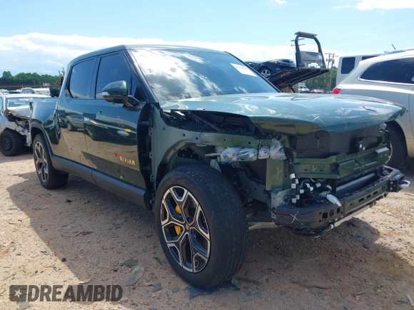 2023 Rivian R1T Adventure z VIN 7FCTGAAAXPN019894, wystawiony jako IAAI lot #42168226 z przebiegiem 23 380 mil mil oraz . Historia ofert i sprzedaży dostępna na DreamBid. Obrazek 1.