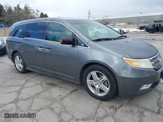 2011 Honda Odyssey Touring with VIN 5FNRL5H99BB077629, listed as a IAAI auction lot 41896538 with 165,240 mi miles. Bid and sale history available at carsss.com. Image 1.