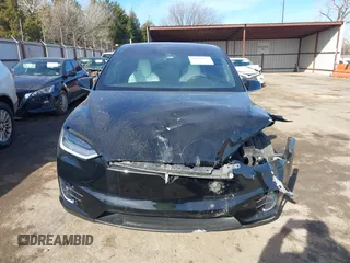 2018 Tesla Model X 75D with VIN 5YJXCDE44JF091690, listed as a IAAI auction lot 41585617 with 128,826 mi miles and . Bid and sale history available at DreamBid. Image 12.