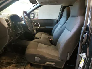 2010 GMC Canyon SLE1 with VIN 1GTJTCDE0A8101092, listed as a Copart auction lot 52311654 with 133,742 mi miles and Salvage title. Bid and sale history available at DreamBid. Image 7.