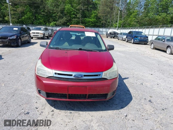 2009 Ford Focus S with VIN 1FAHP34N69W102568, listed as a IAAI auction lot 42137185 with 113,099 mi miles. Bid and sale history available at carsss.com. Image 6.