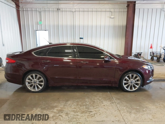2017 Ford Fusion Titanium with VIN 3FA6P0K91HR171231, listed as a IAAI auction lot 41131312 with 115,265 mi miles. Bid and sale history available at carsss.com. Image 13.