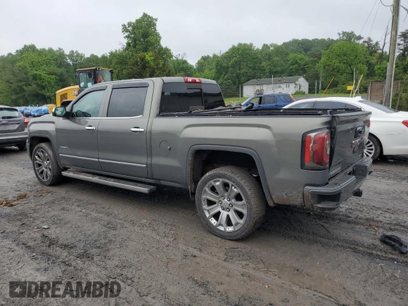2017 GMC Sierra 1500 Denali z VIN 3GTU2PEJ1HG293825, wystawiony jako Copart lot #56851725 z przebiegiem 91 439 mil mil oraz Szkoda całkowita • Salvage title. Historia ofert i sprzedaży dostępna na DreamBid. Obrazek 2.