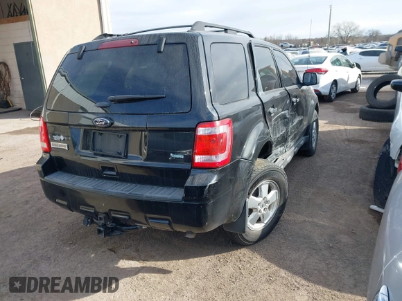 2011 Ford Escape XLT with VIN 1FMCU9DG3BKB95799, listed as a IAAI auction lot 41058817 with Not provided miles and . Bid and sale history available at DreamBid. Image 4.