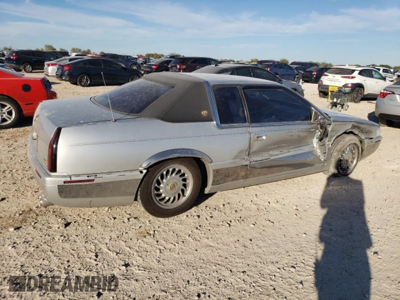 2000 Cadillac Eldorado Touring with VIN 1G6ET1295YU145248, listed as a Copart auction lot 82160574 with 87,294 mi miles and Salvage Title. Bid and sale history available at DreamBid. Image 3.