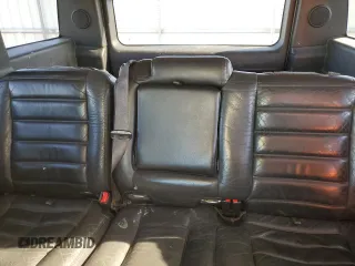 2005 Hummer H2 SUV with VIN 5GRGN23U55H128736, listed as a Copart auction lot 41780105 with 185,193 mi miles and Salvage Title. Bid and sale history available at carsss.com. Image 10.
