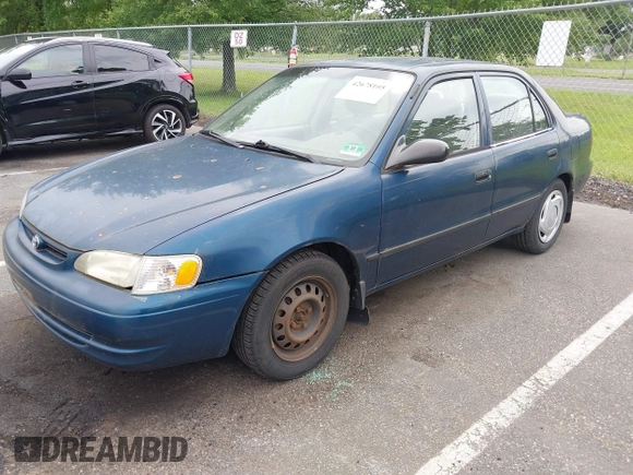1999 Toyota Corolla VE with VIN 1NXBR12E8XZ283162, listed as a IAAI auction lot 42678105 with 186,760 mi miles and . Bid and sale history available at DreamBid. Image 2.