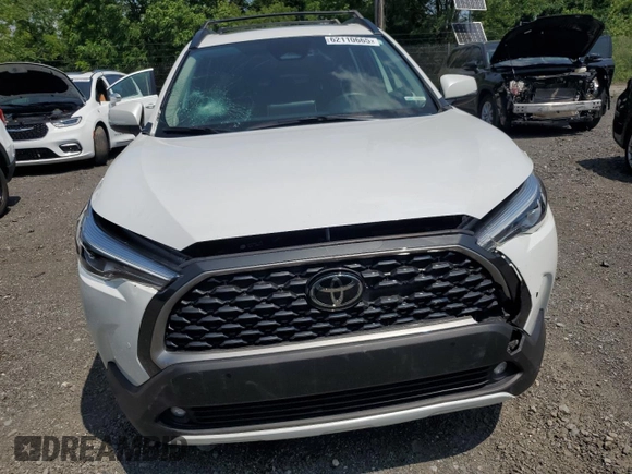 2023 Toyota Corolla Cross XLE with VIN 7MUDAABGXPV060797, listed as a Copart auction lot 62110665 with 18,293 mi miles and Salvage title. Bid and sale history available at DreamBid. Image 5.