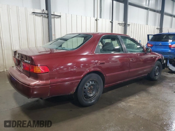 2000 Toyota Camry CE z VIN 4T1BG22K2YU938855, wystawiony jako Copart lot #56047305 z przebiegiem 129 096 mil mil oraz Szkoda całkowita • Salvage title. Historia ofert i sprzedaży dostępna na DreamBid. Obrazek 3.